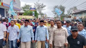 Ribuan Pendukung BK-UHS Jalan Kaki Kawal Pendaftaran ke KPU Halsel